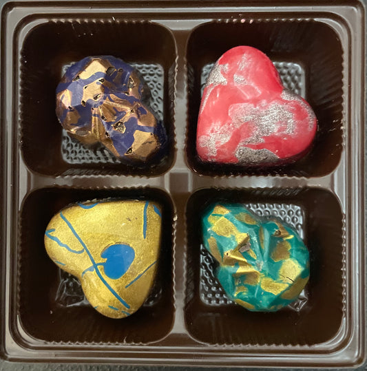 Hearts and Skulls 4-Piece Gift Box by Marvin's Confections, a charming old-world chocolate shop in Charlotte, North Carolina. 